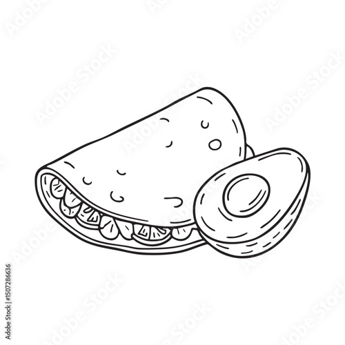 A tortilla resting beside a slice of avocado