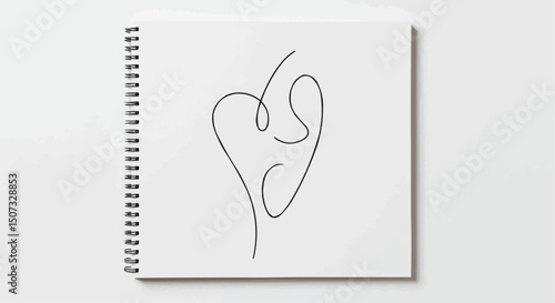 A Simple Line Heart Drawing in a Sketchbook