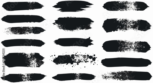 A grunge vector illustration featuring a set of black ink splash and paint brush stroke design elements for borders and frames