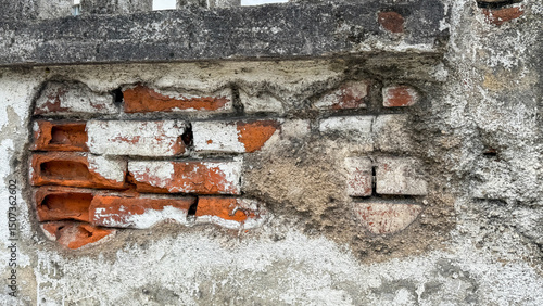 Aging brick wall's rustic decay whispers tales of time, urban archaeology charm, and secretive Festivus celebrations