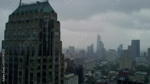 View of a classic city skyline shrouded in early morning clouds and haze