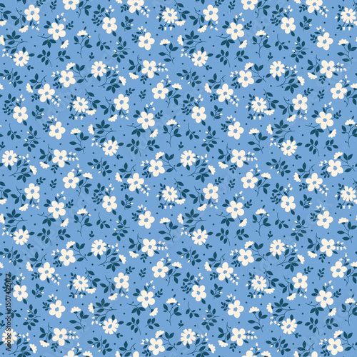 Beautiful floral pattern in small flowers. Small floral flowers. Seamless pattern background. Ditsy print. Floral seamless background. Elegant flowers template for wall decor, wallpaper, cards.