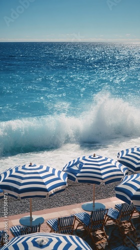 Experience the Tranquility of a Sunny Beach With Striped Umbrellas and Ocean ...