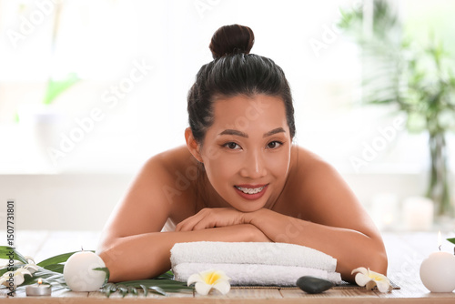 Beautiful Asian woman relax...