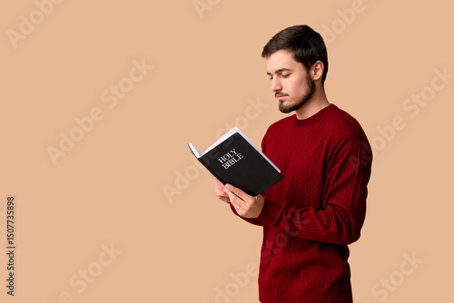 Religious young man reading...