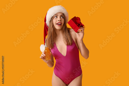 Happy young woman in swimsu...