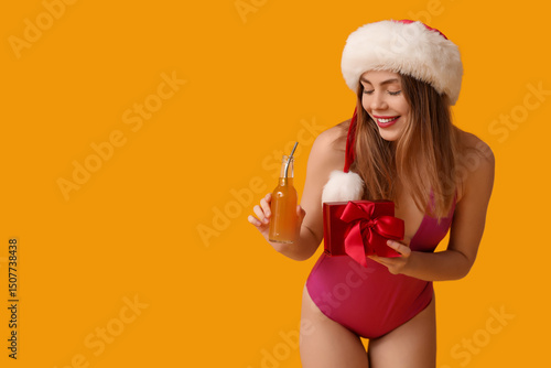 Happy young woman in swimsu...