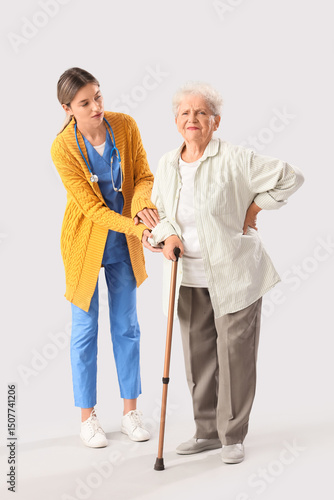 Senior woman with back pain...