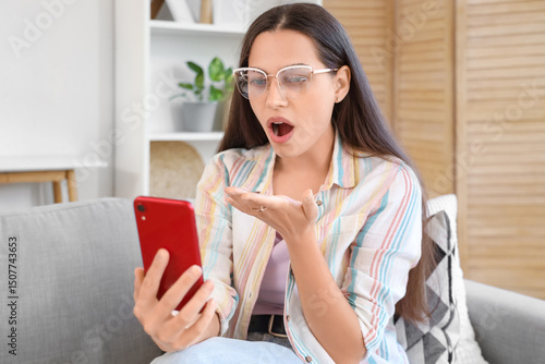 Shocked young woman video c...