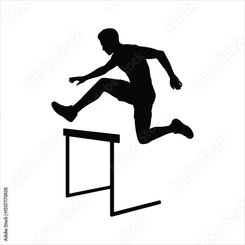 Silhouette of male hurdler jumping over hurdle