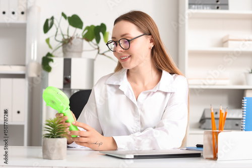 Young businesswoman with mi...