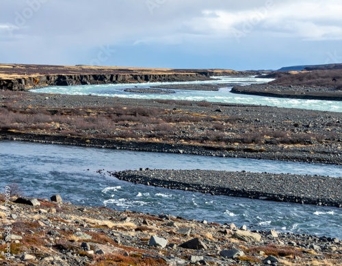Wallpaper Mural Tranquil River Landscape with Rocky Bank and Calm Waters in Nature Torontodigital.ca