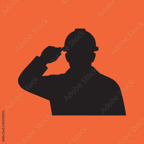Silhouette of construction worker saluting