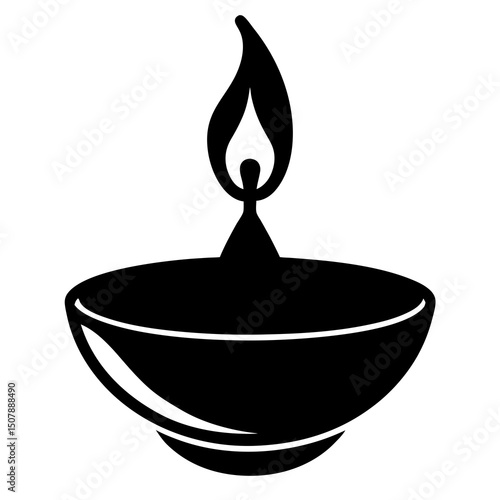 burning candle in a blue glass bowl