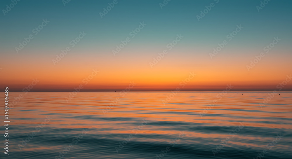 Obraz premium Serene Ocean Sunset Calm Waters at Golden Hour Tranquil Seascape