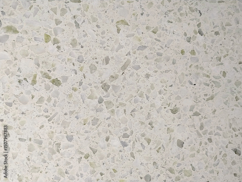 Mosaico de terrazo claro blanco gris y verde. Se puede usar como fondo.