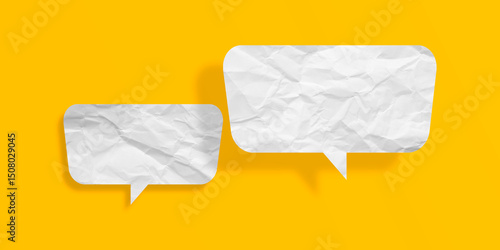 White speech bubble crumpled paper isolated on yellow background