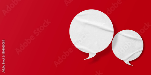 White speech bubble crumpled paper isolated on red background