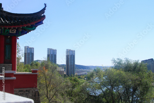 Wallpaper Mural A Chinese tower temple architecture near a city. Torontodigital.ca