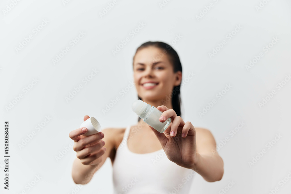 Skincare routine, woman applying cream, healthy lifestyle, beauty concept, natural skincare, smiling, minimalistic background, white tones, personal care, wellness Skincare routine, woman applying cream, healthy lifestyle, beauty concept, natural skincare, smiling, minimalistic background, white tones, personal care, wellness
