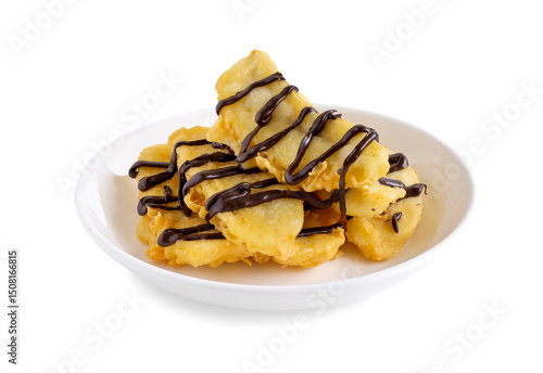 Pisang Goreng coklat or banana fritters with chocolate on top served in white plate