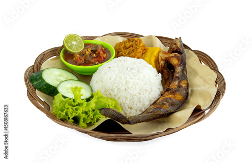 Pecel lele is a typical Indonesian food, consisting of fried catfish served with chili sauce and fresh vegetables