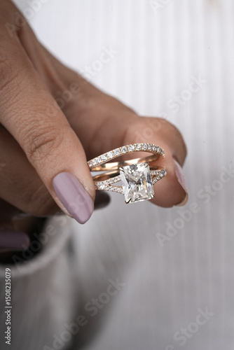 woman elegant finger ring with white diamond 