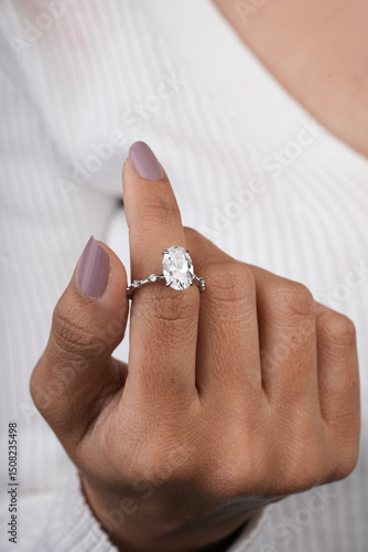 woman elegant finger ring with white diamond 