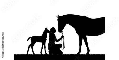 Silhouette of Horse Trainer with Foal and Mare on Celebration of the Horse Day