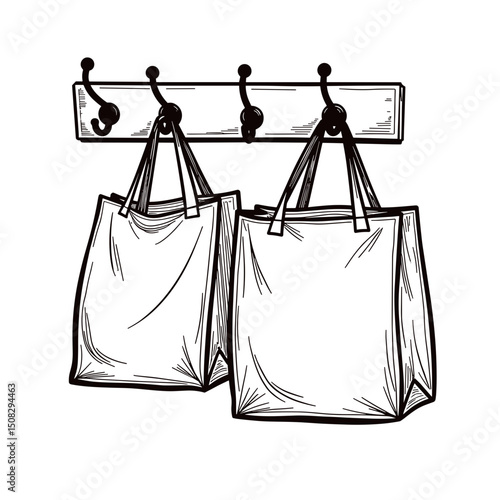 Reusable shopping bags hanging on wall hooks, minimalism concept