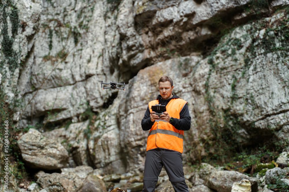 Drone Operator Surveying Rocky Canyon Drone Operator Surveying Rocky Canyon