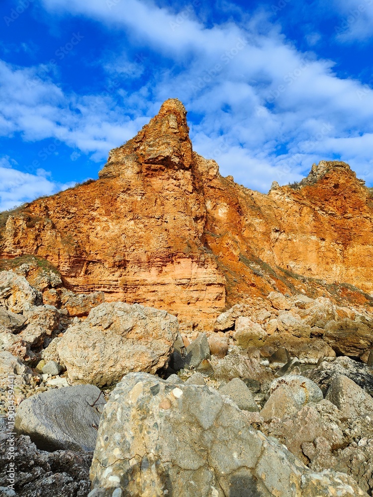 Fototapeta premium beauty of Bolata Beach, a hidden gem on the Black Sea coast of Bulgaria. Surrounded by red cliffs and calm turquoise waters