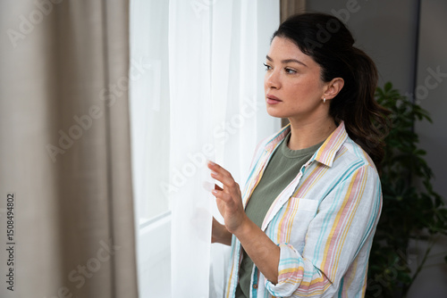 фотографія Mental health, woman and nervous of thinking in home with failure, paranoid and regret trauma