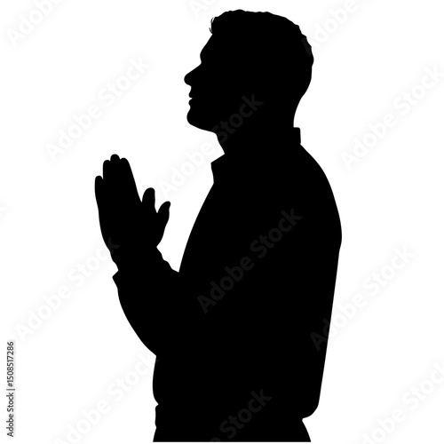Male silhouette with hands together in a praying position  