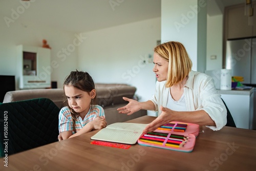 Fotografija Child receives reprimand in cozy home environment