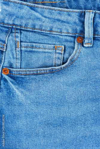 Obraz na plátne Front pocket, small pocket and waistband of blue jeans pants close up, macro