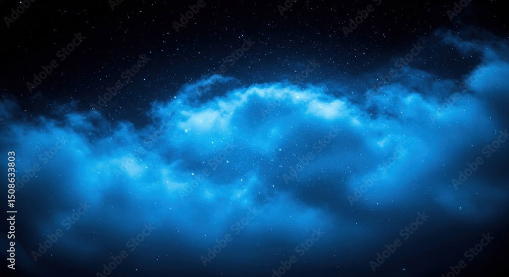 Obraz premium A celestial spectacle unfolds with a vibrant blue nebula amidst a star-studded night sky, evoking a sense of cosmic wonder and ethereal beauty in the vast expanse of space