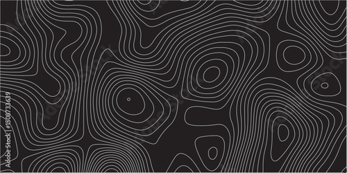  A detailed topographic map pattern featuring thin gray contour lines on a solid black background, indicating varying elevations of a landscape.