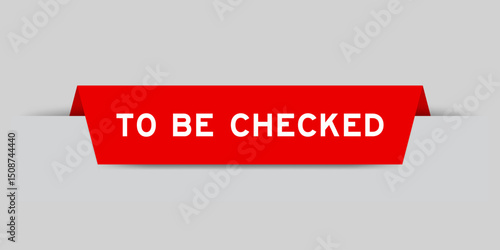 Red color inserted label with word to be checked on gray background