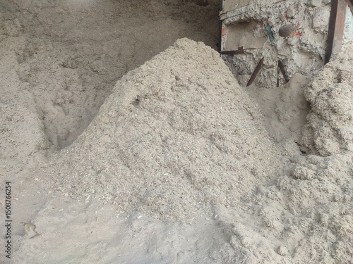 Sugarcane bagasse, a sugar mill byproduct, reused as eco-friendly fuel—sustainable energy from agricultural waste.