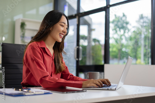 Businesswoman working with laptop, smartphone, and tablet. modern digital workspace concept. Free Download Businesswoman working with laptop, smartphone, and tablet. modern digital workspace concept. - GFXLoad
