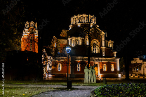 Obraz na plátně A night shot of a brightly lit Orthodox church with traditional medieval architecture