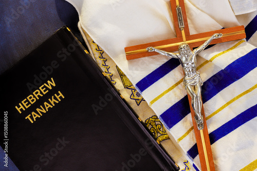 Fotografie 24 April 2025 Jerusalem Israel Hebrew Tanakh, a crucifix, tallit are arranged together, symbolizing Messianic Jewish Congregation of faith tradition