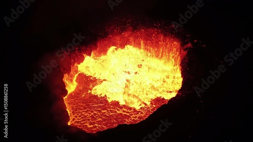 Wallpaper Mural Close-up of the crater of an erupting volcano spewing lava at night.
 Torontodigital.ca