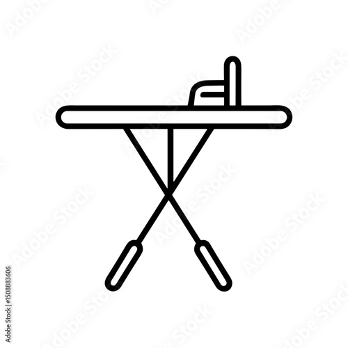 Ironing board with iron ready for use in summer wardrobe preparation  