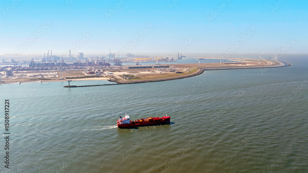 Obraz premium Aerial from industry in the harbor from Rotterdam in the Netherlands