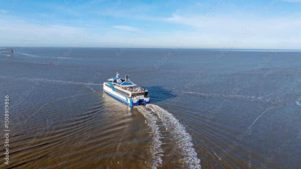 Aerial from ferry to Terschelling leaving the harbor from Harlingen in the Netherlands
