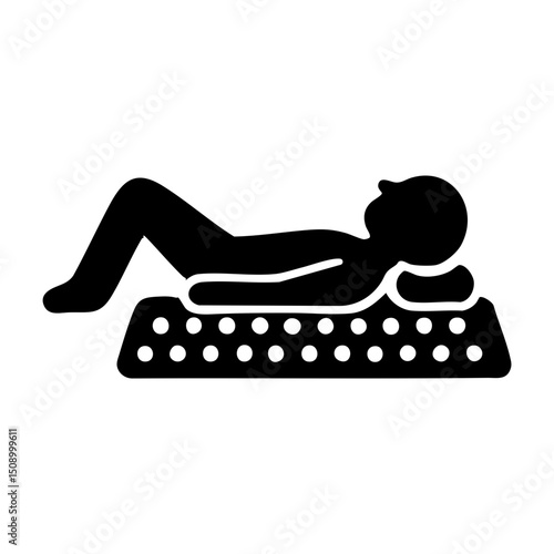 Person lying on acupressure mat icon