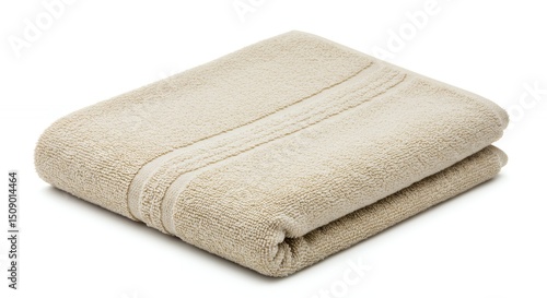 Folded beige bath towel