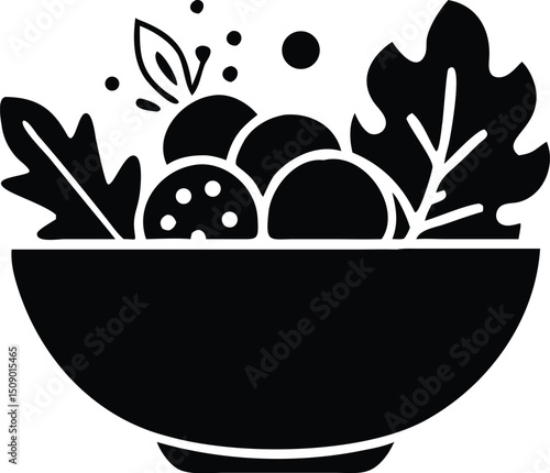 A monochrome bowl shows a fresh salad with leafy greens and meatballs on white